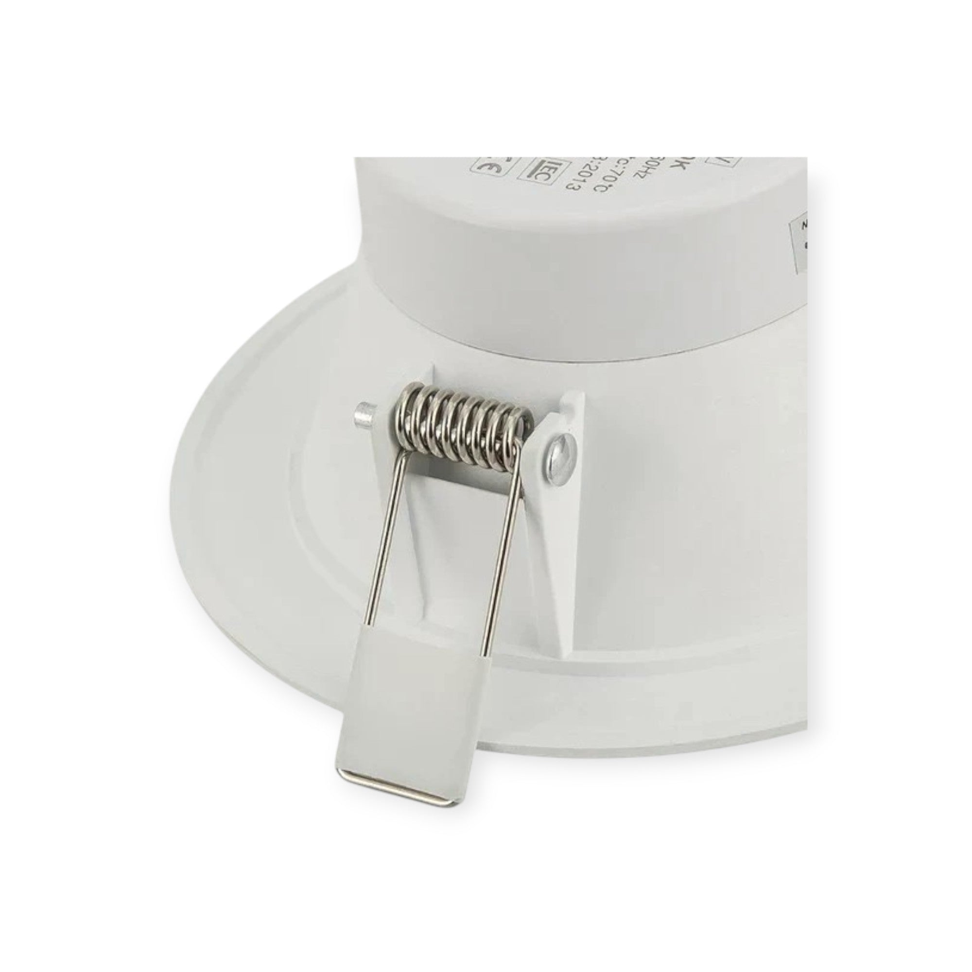 Close-up of a white light fixture on a white background