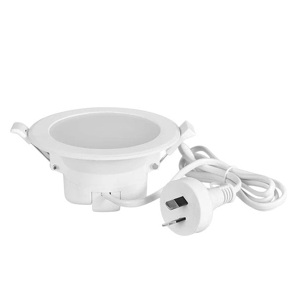 White light fixture with power cord on a white background