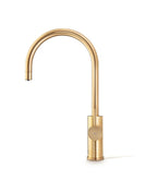 Gold kitchen faucet on a white background