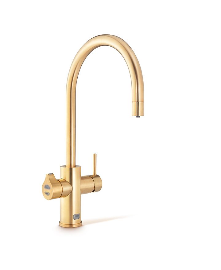 Gold kitchen faucet on a white background