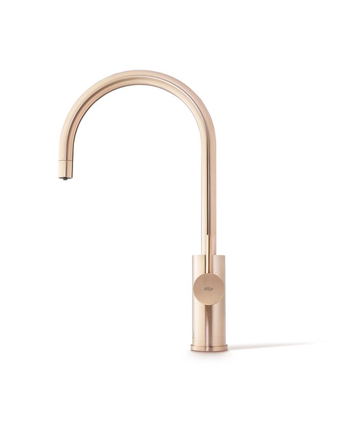 Modern rose gold kitchen faucet on a white background