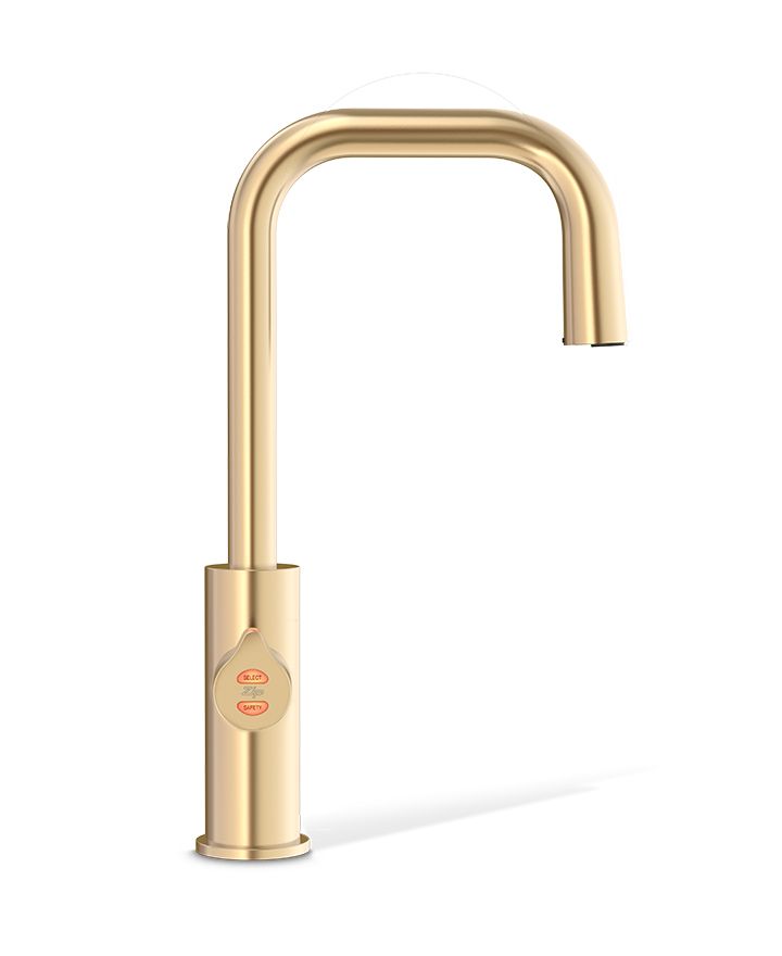Gold kitchen faucet on a white background