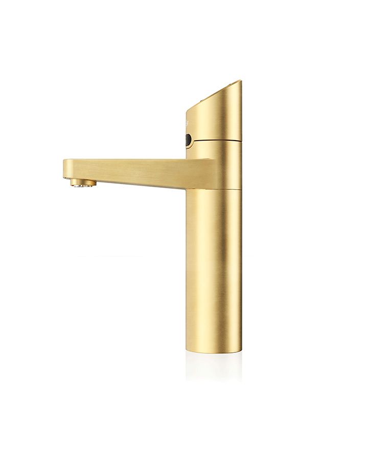 Gold faucet on a white background