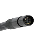 Close-up of a black camera lens on a white background