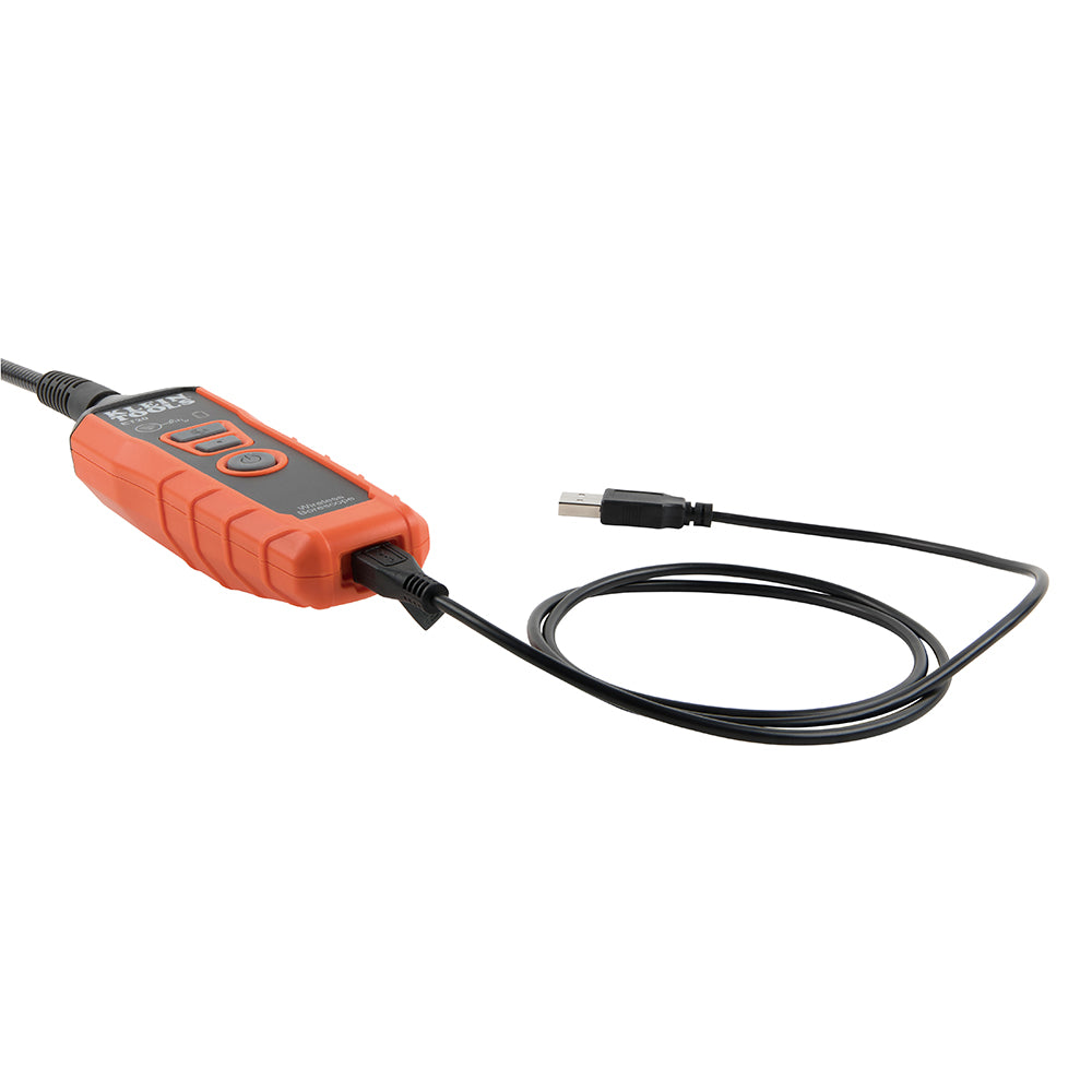 Orange and black electronic device with USB cable on a white background