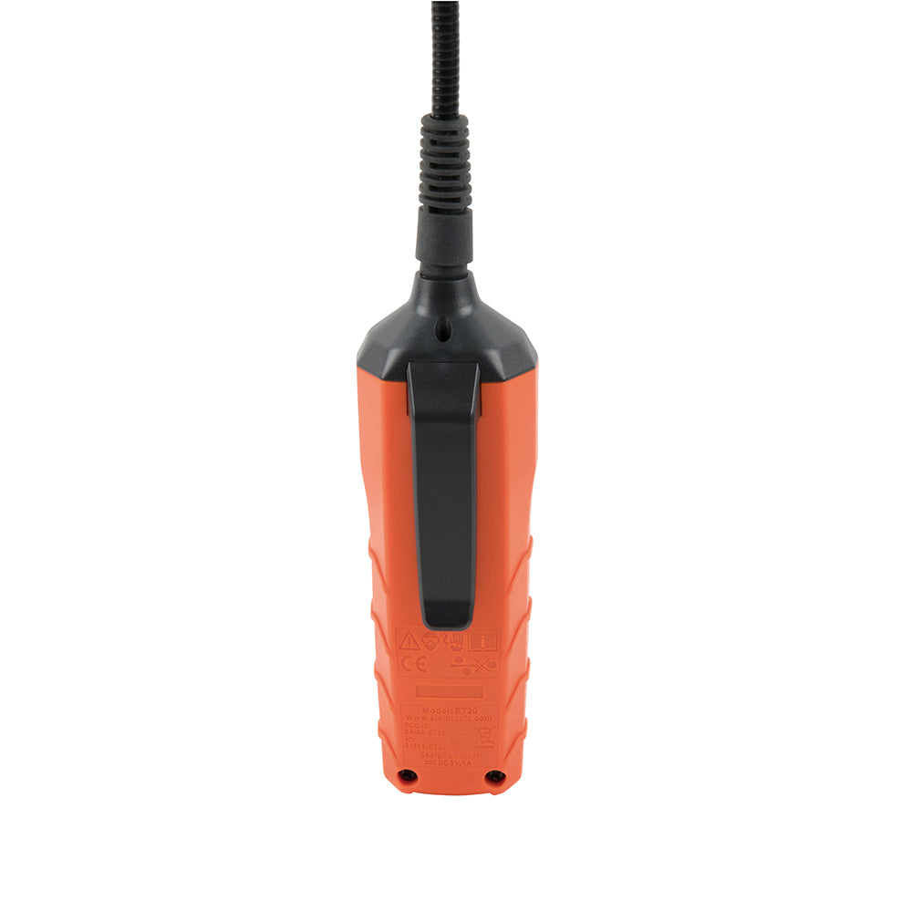 Orange and black handheld device with a cable on a white background