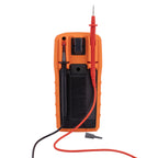 Orange multimeter with red and black probes on a white background