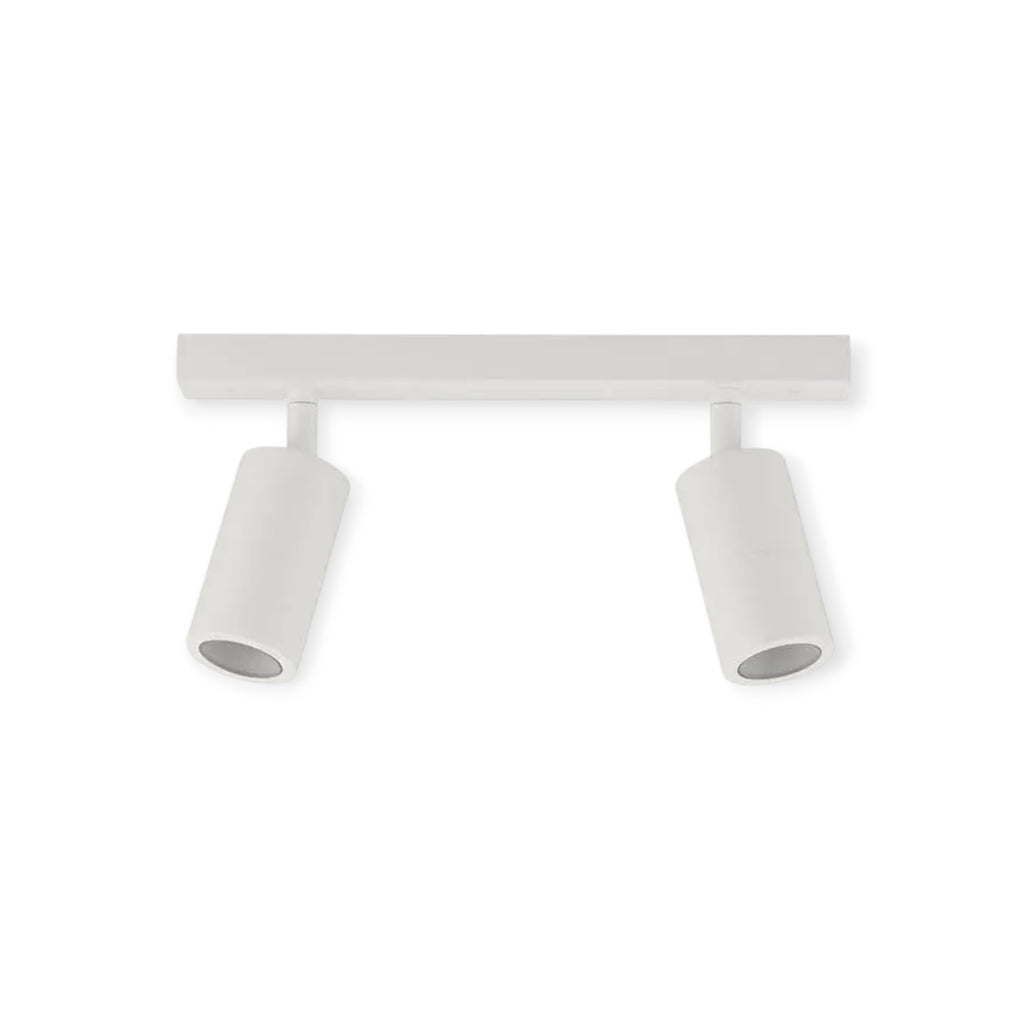 White ceiling light fixture with two cylindrical lights on a white background