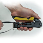 Hand holding a cable cutter with a clear background