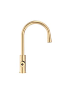 Gold kitchen faucet on a white background