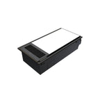 Black rectangular device with a metallic top on a white background