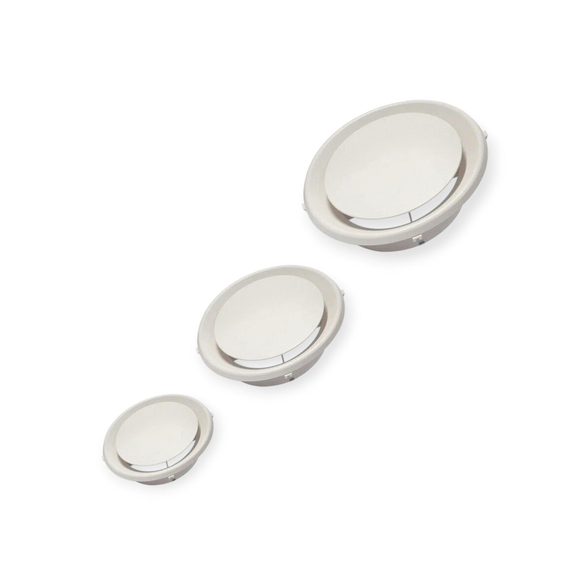 Set of four silver circular objects on a white background