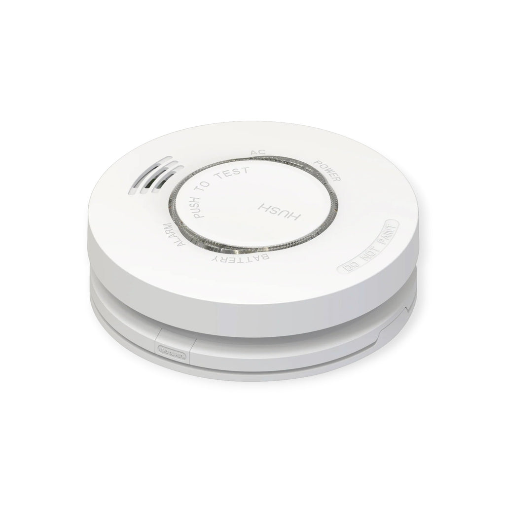 White smoke detector on a white background